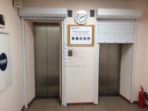 Рольставни поверх лифтов